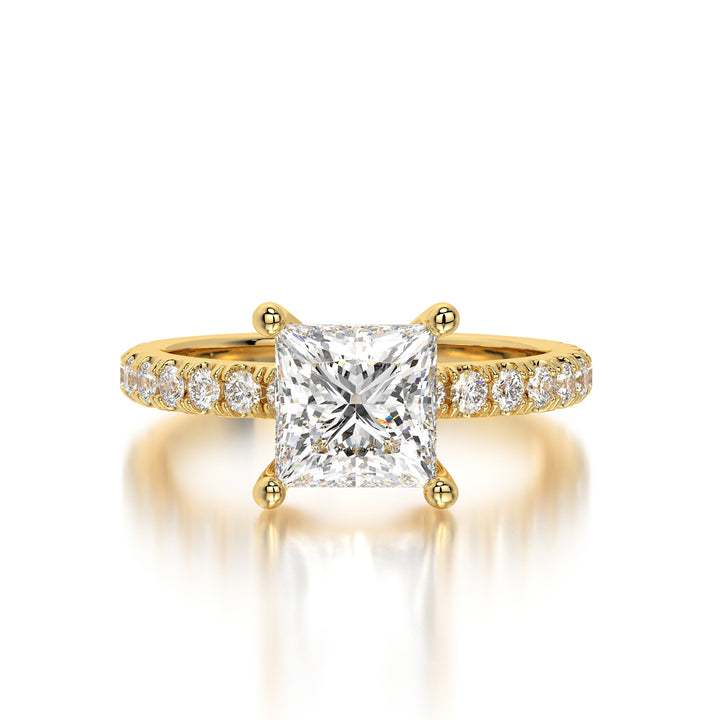 Front-facing image of a princess cut diamond engagement ring in 18K yellow gold, showcasing a 1.85 carat lab-grown solitaire with F color and VS1 clarity.