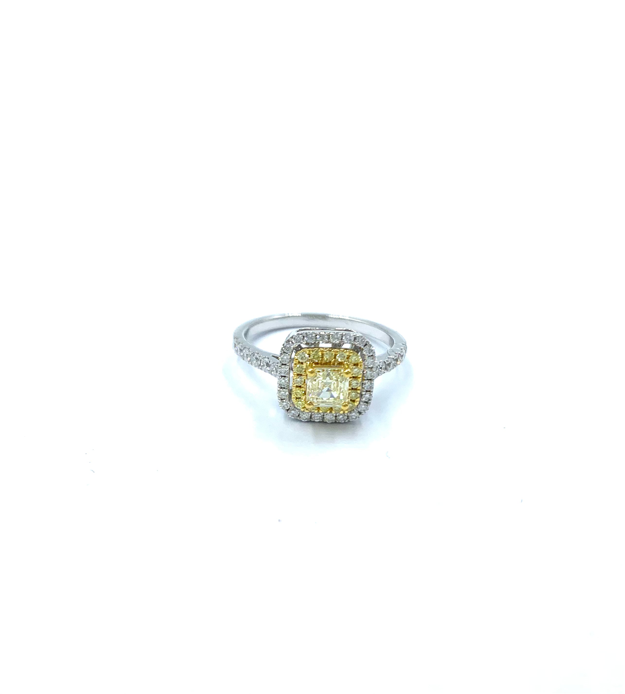 Cushion shape fancy yellow diamond ring