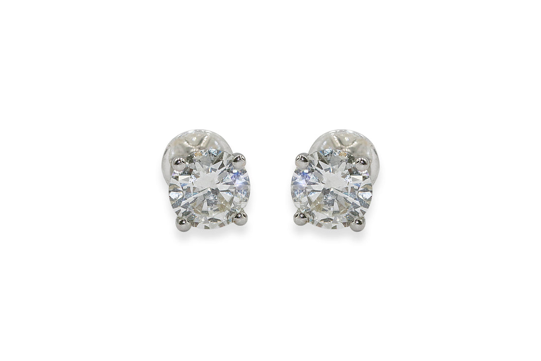 Shop elegant 4 prong solitaire diamond earrings, perfect for special occasions and daily wear.
