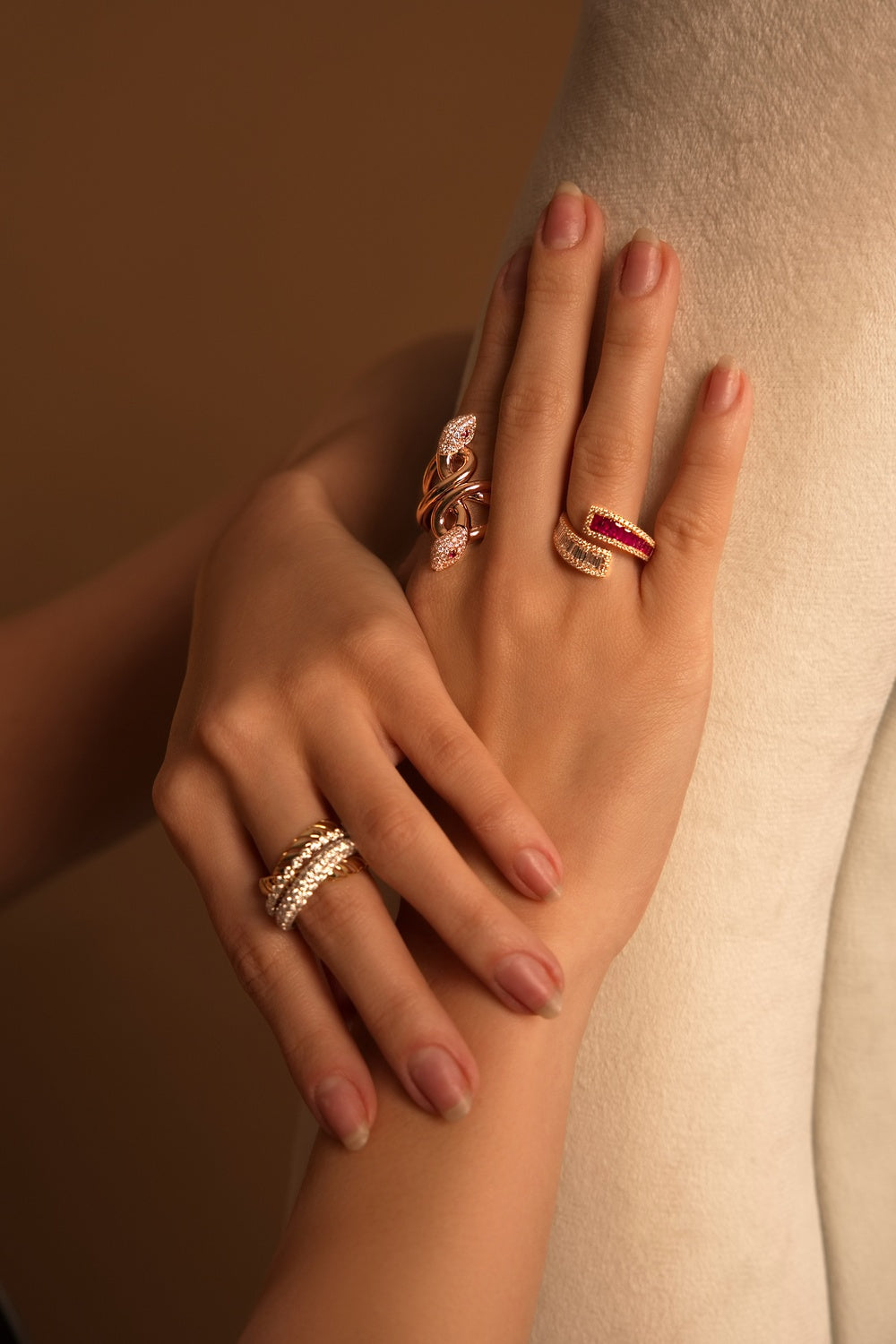 bold ruby and diamond statement ring, contemporary gemstone ring design, modern open wrap ring with rubies and diamonds, fine jewelry from Dubai, high-end ruby ring in rose gold, fashion-forward gemstone ring, handcrafted ruby ring EVA GEMS