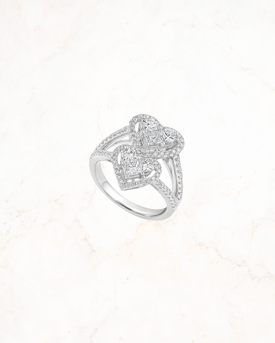 custom jewelry store Dubai, white gold heart motif ring, EVA GEMS luxury diamond collection, handcrafted heart diamond ring, love-inspired ring Dubai, best diamond ring shop UAE, elegant bridal ring EVA GEMS