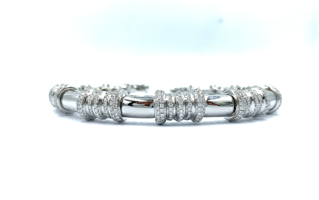 Shop women’s custom diamond bangles – unique designs available at EVA GEMS Dubai.