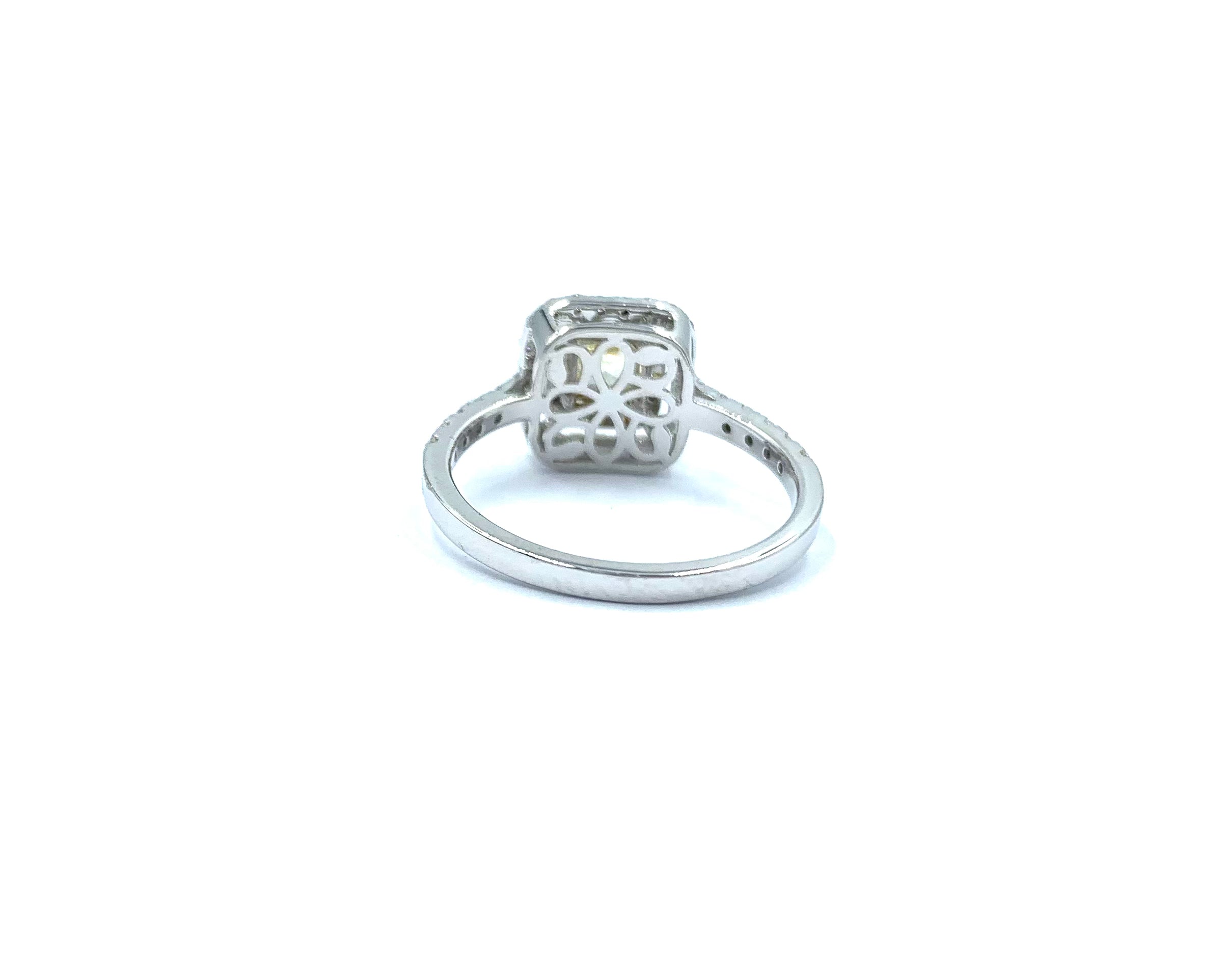 Cushion shape fancy yellow diamond ring