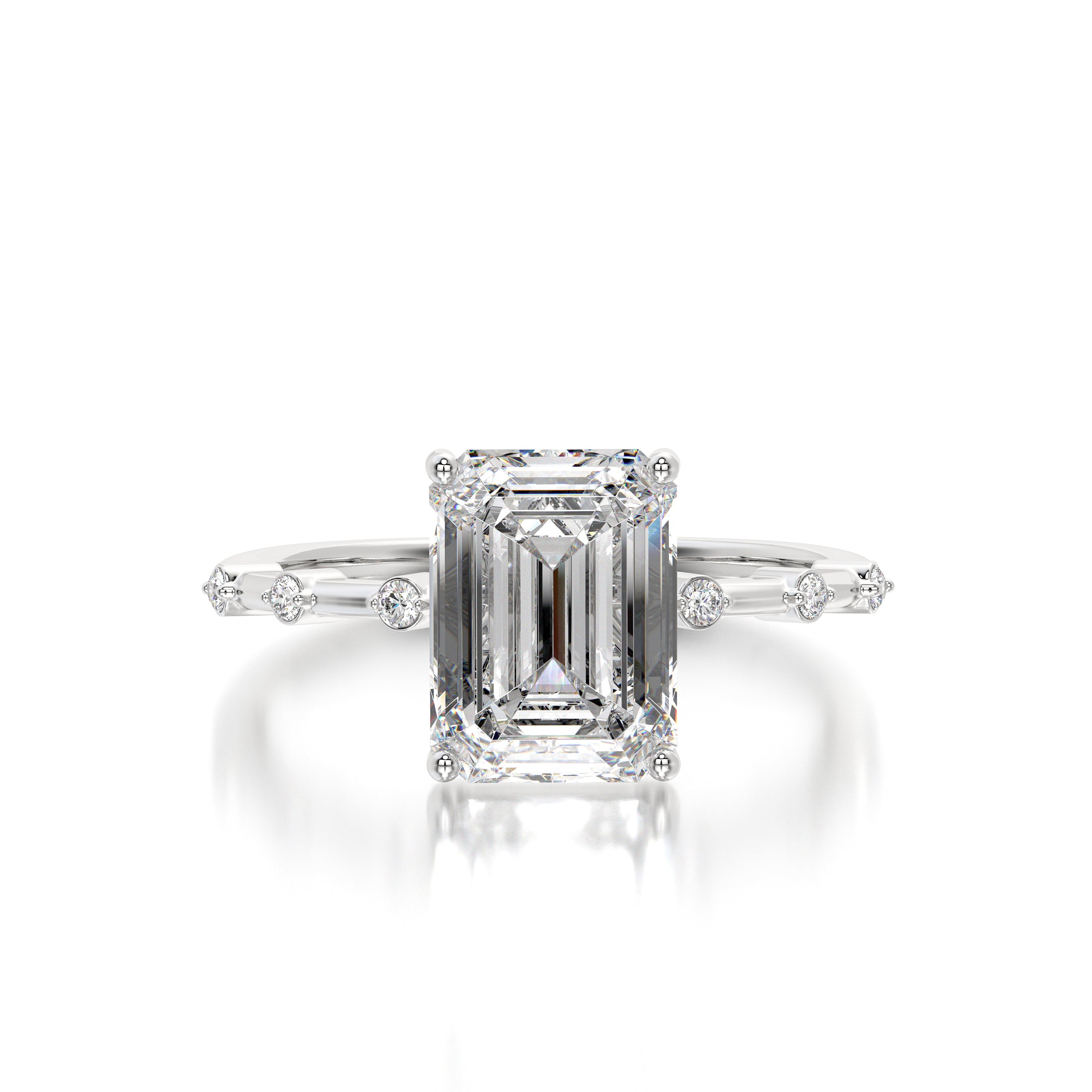 Angled image of a 2.85 carat emerald-cut lab-grown diamond ring in 18K white gold, featuring a sleek east-west setting.