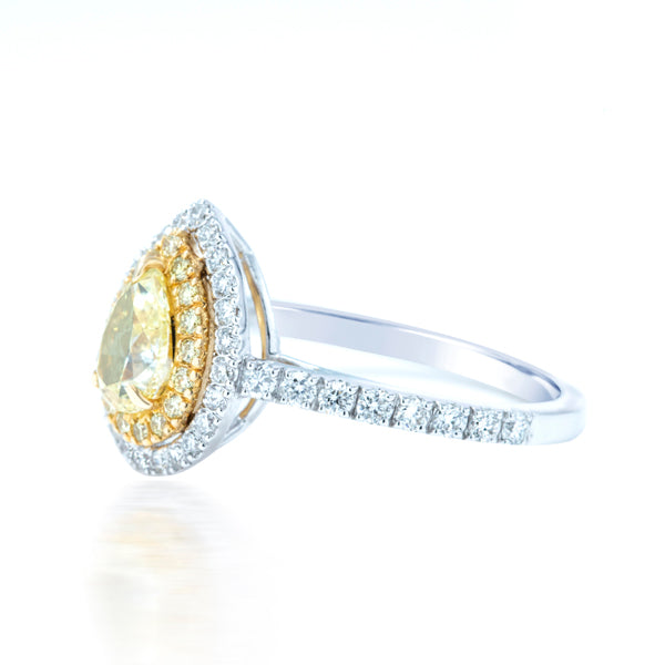 Shop luxury yellow diamond engagement rings in Dubai – 1.31CTS pear-shaped design.
