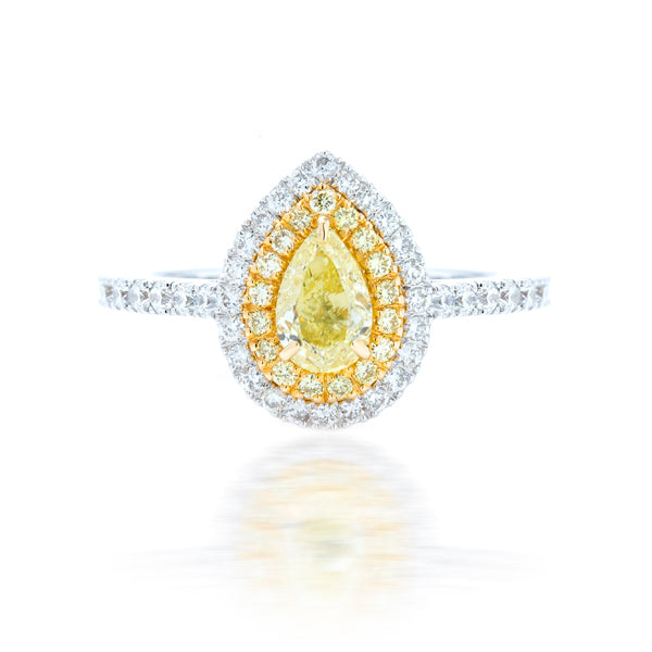 Elegant fancy yellow diamond engagement ring, crafted with a 1.31CTS pear shape in Dubai.