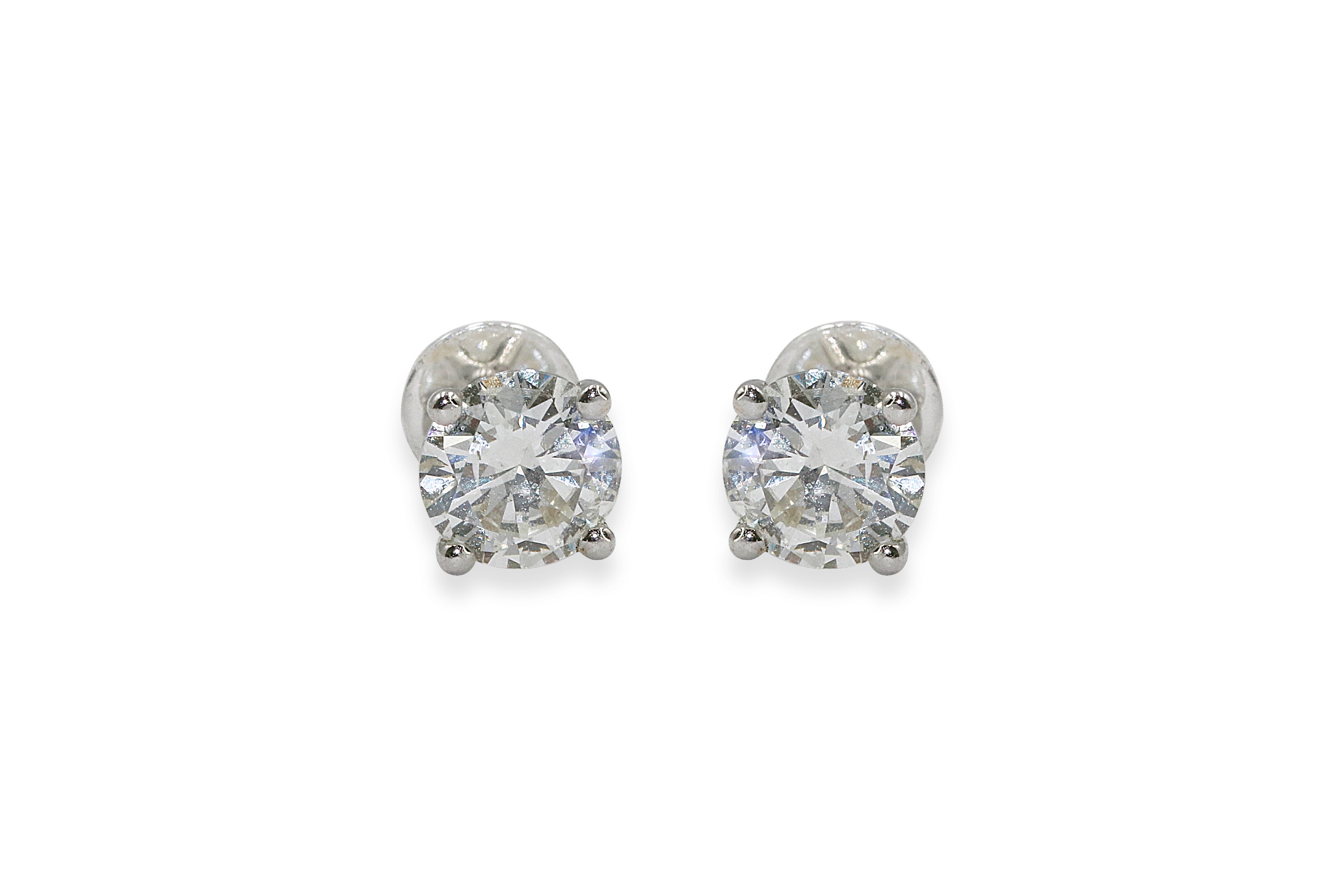 Shop elegant 4 prong solitaire diamond earrings, perfect for special occasions and daily wear.