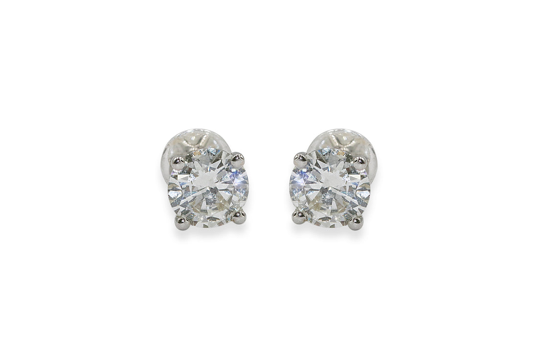 Shop elegant 4 prong solitaire diamond earrings, perfect for special occasions and daily wear.