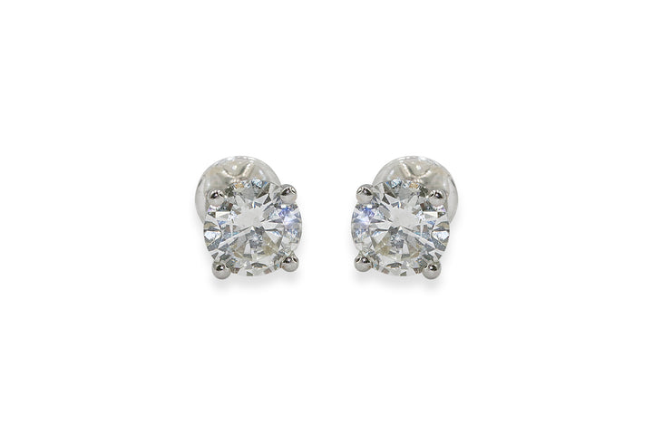 Shop elegant 4 prong solitaire diamond earrings, perfect for special occasions and daily wear.